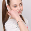 Bransoletka srebrna pozłacana na zielonym sznurku - nieskończoność - Hippie