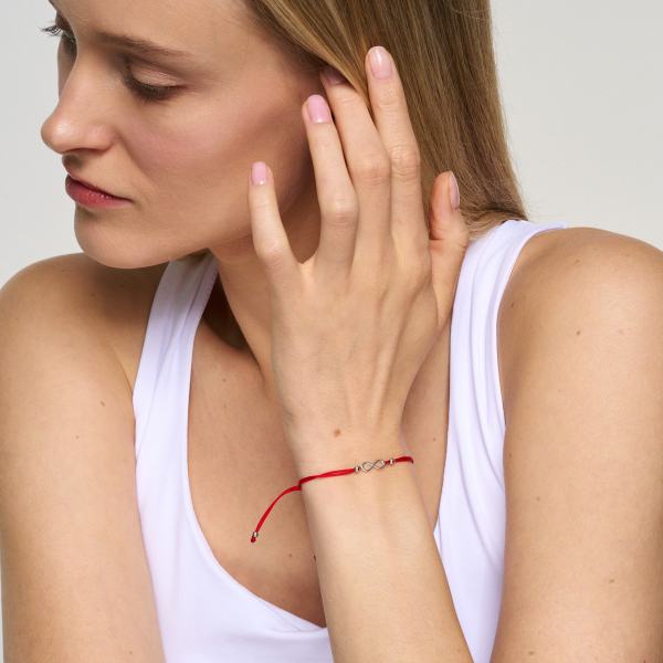 Bransoletka srebrna na czerwonym sznurku - nieskończoność - Hippie